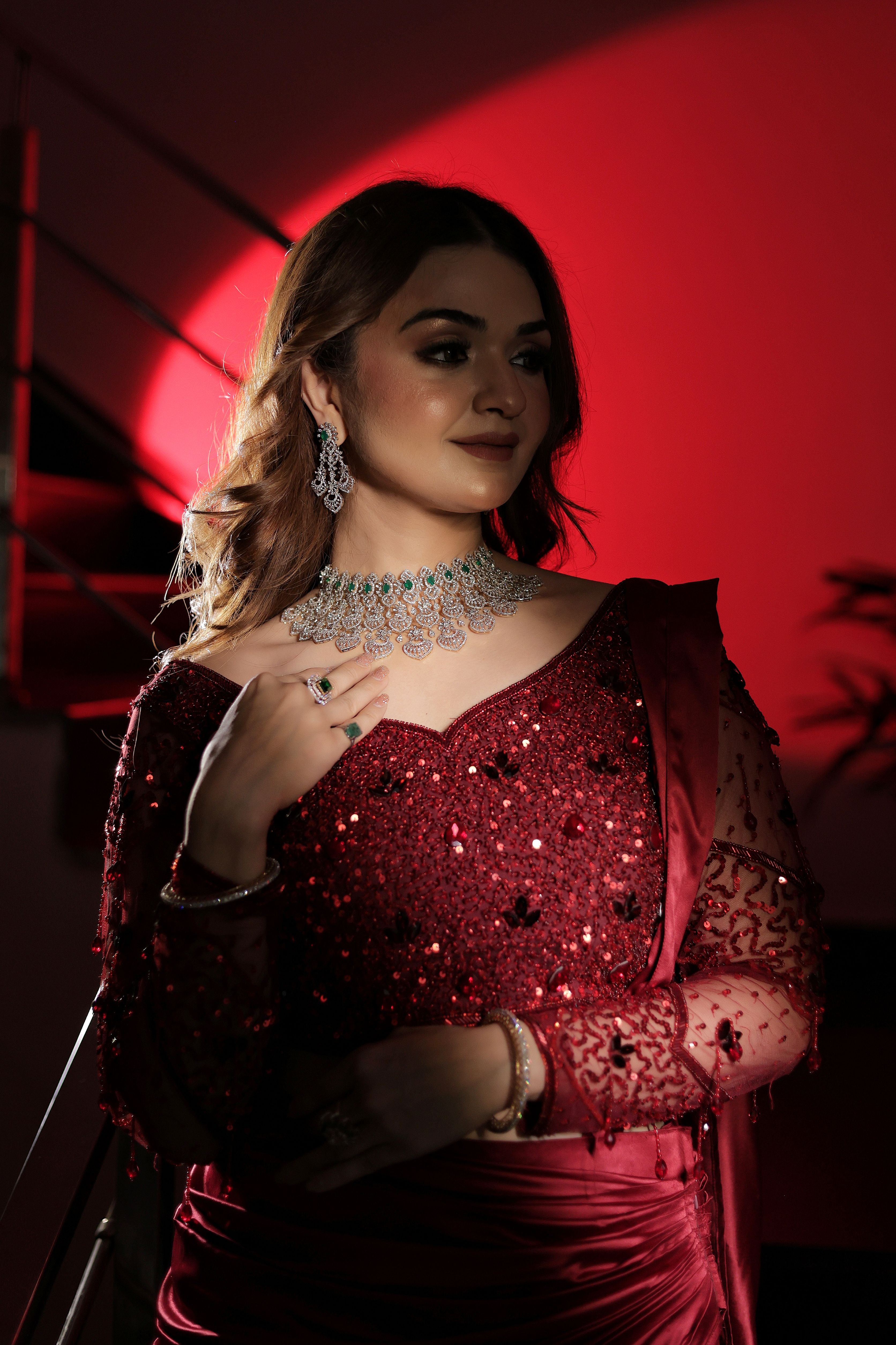 Mehroon stone work drape lehenga with attached palla