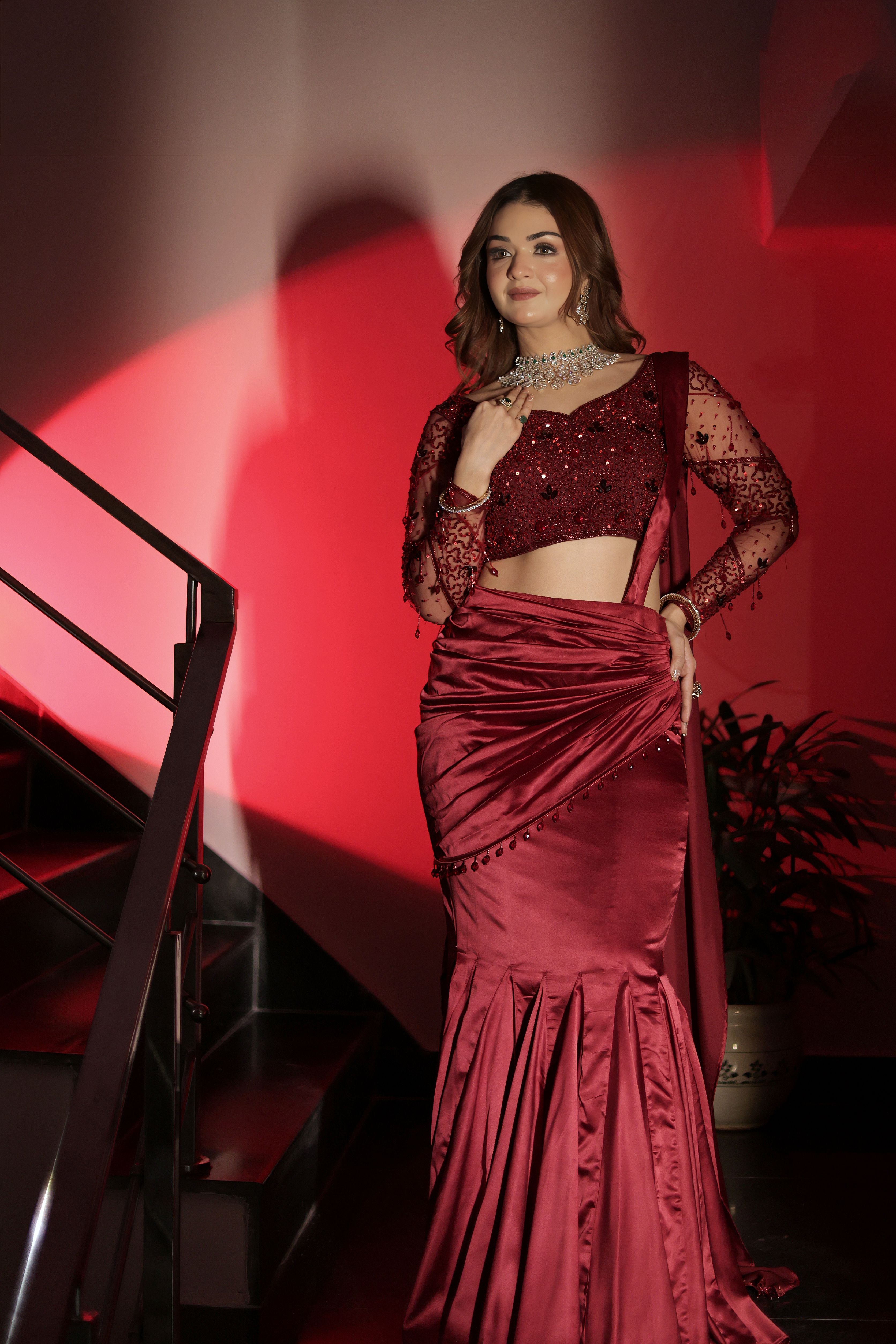 Mehroon stone work drape lehenga with attached palla
