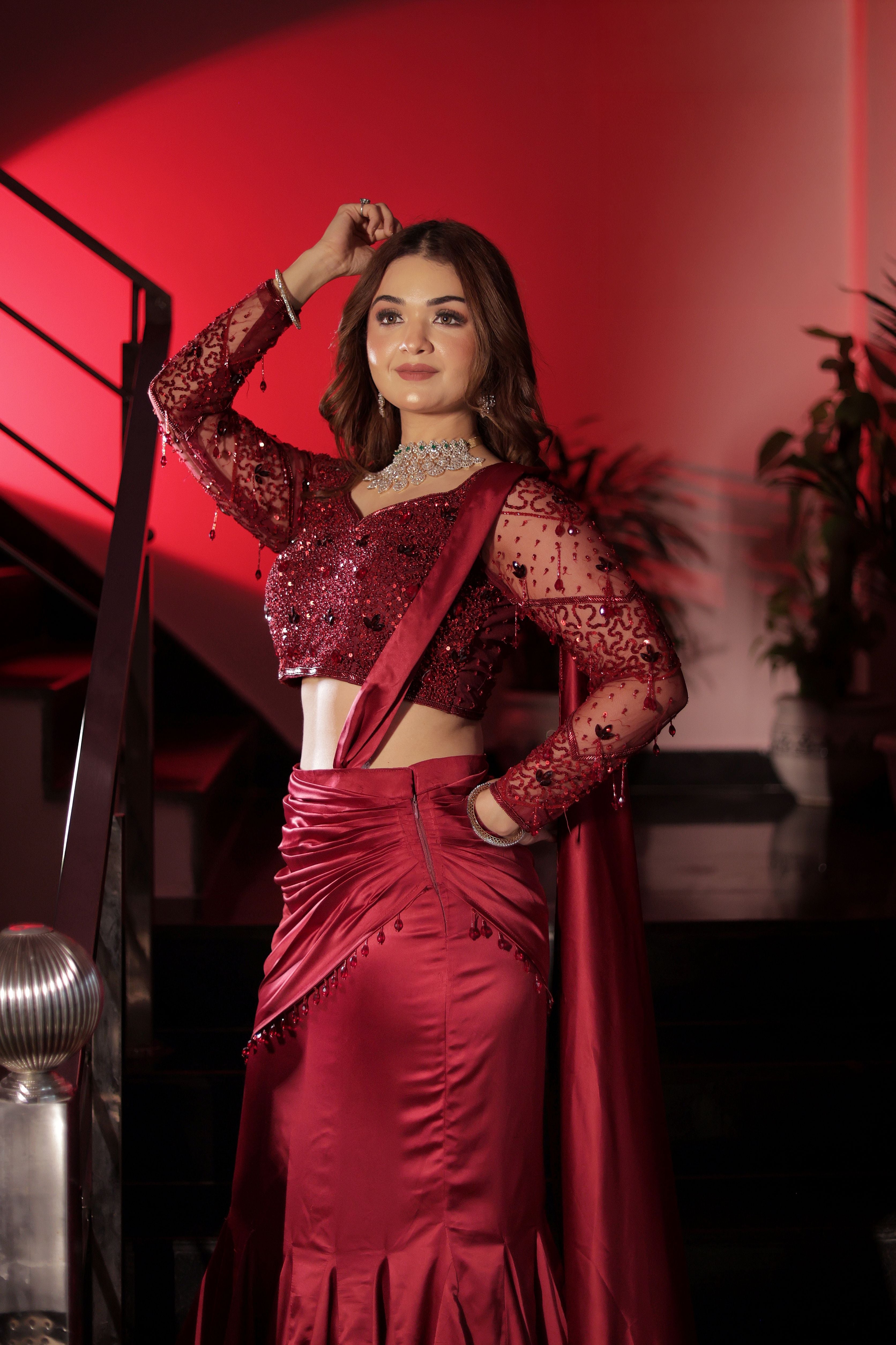 Mehroon stone work drape lehenga with attached palla