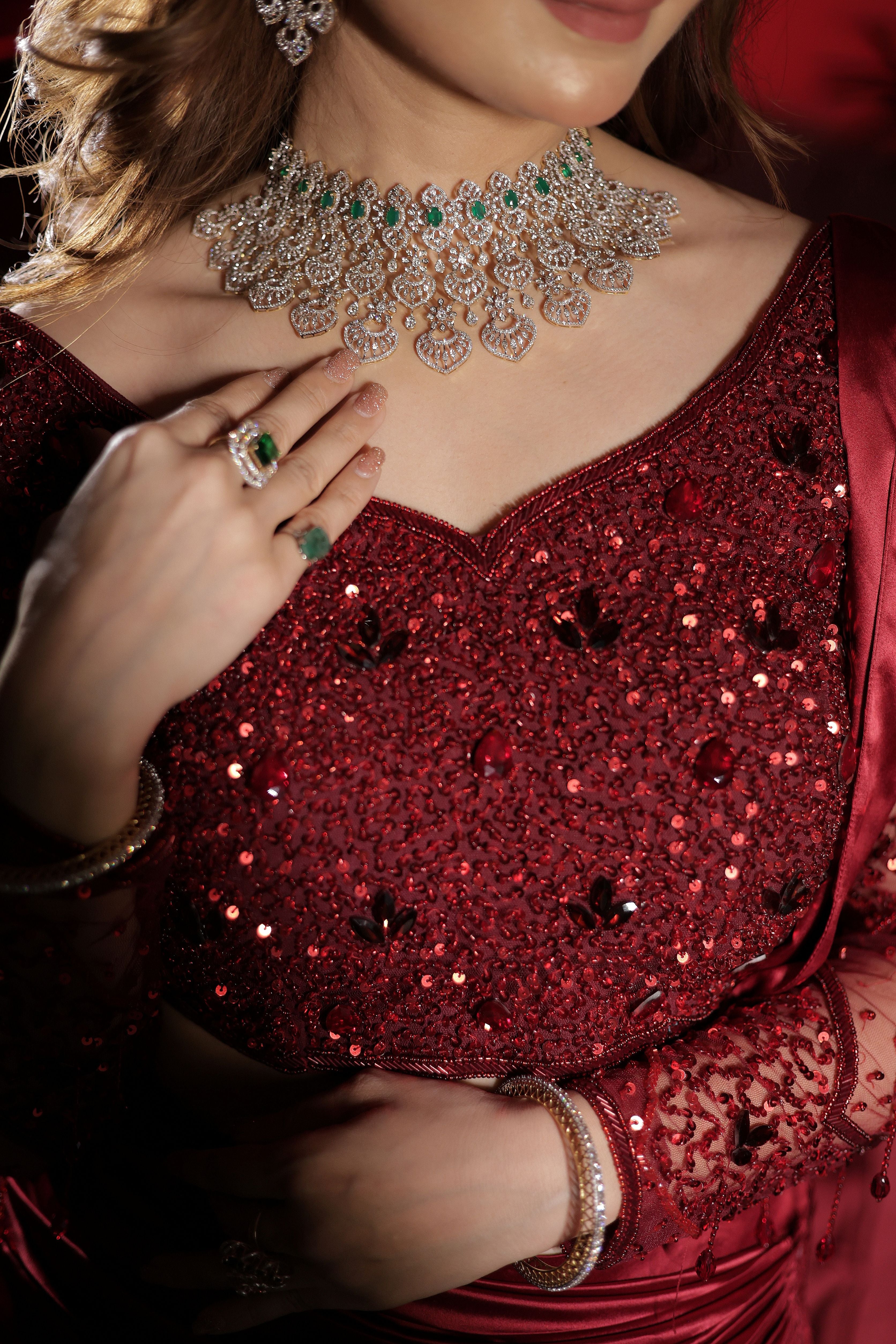 Mehroon stone work drape lehenga with attached palla