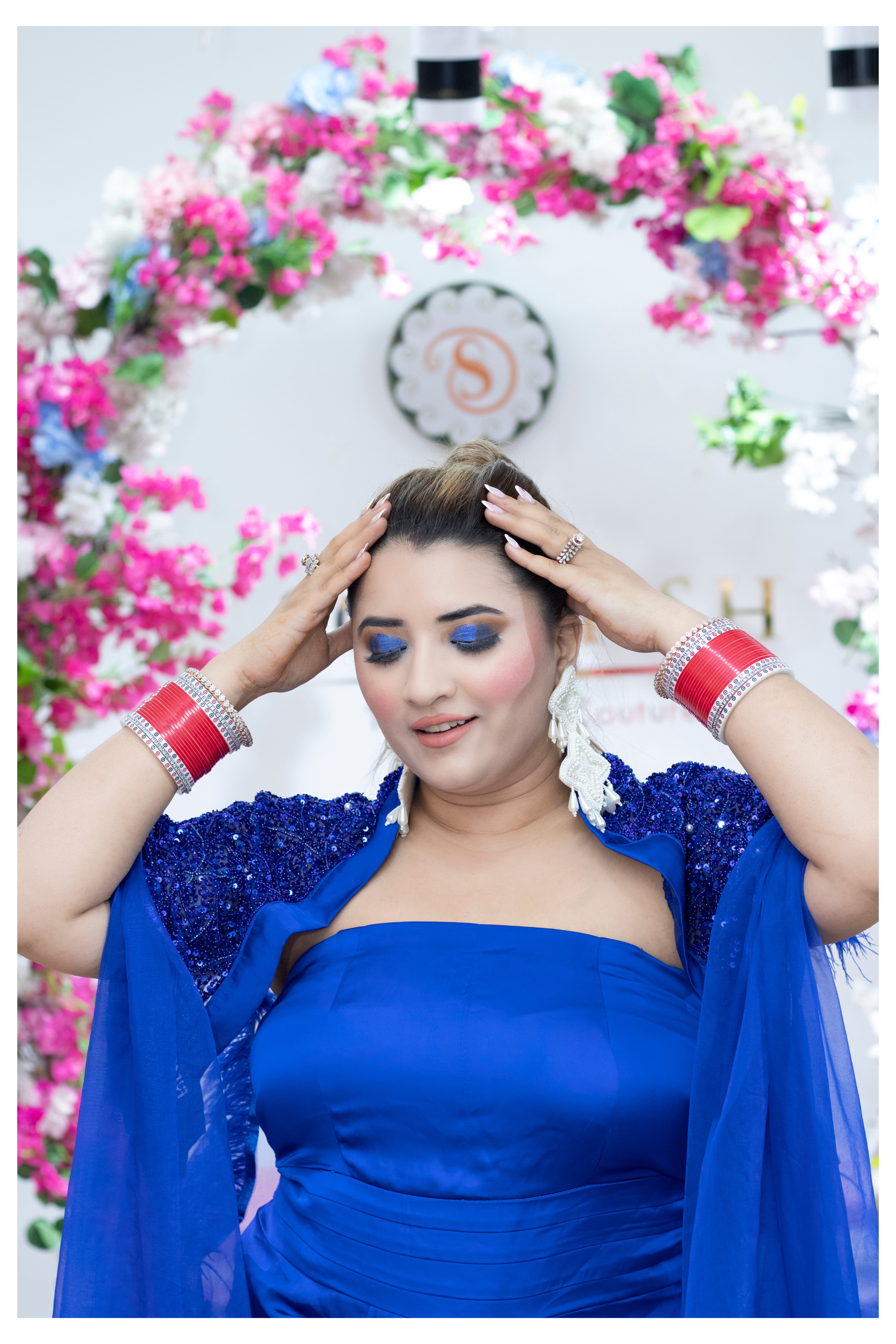 Royal blue armani satin drape dress with hand work feathers cape