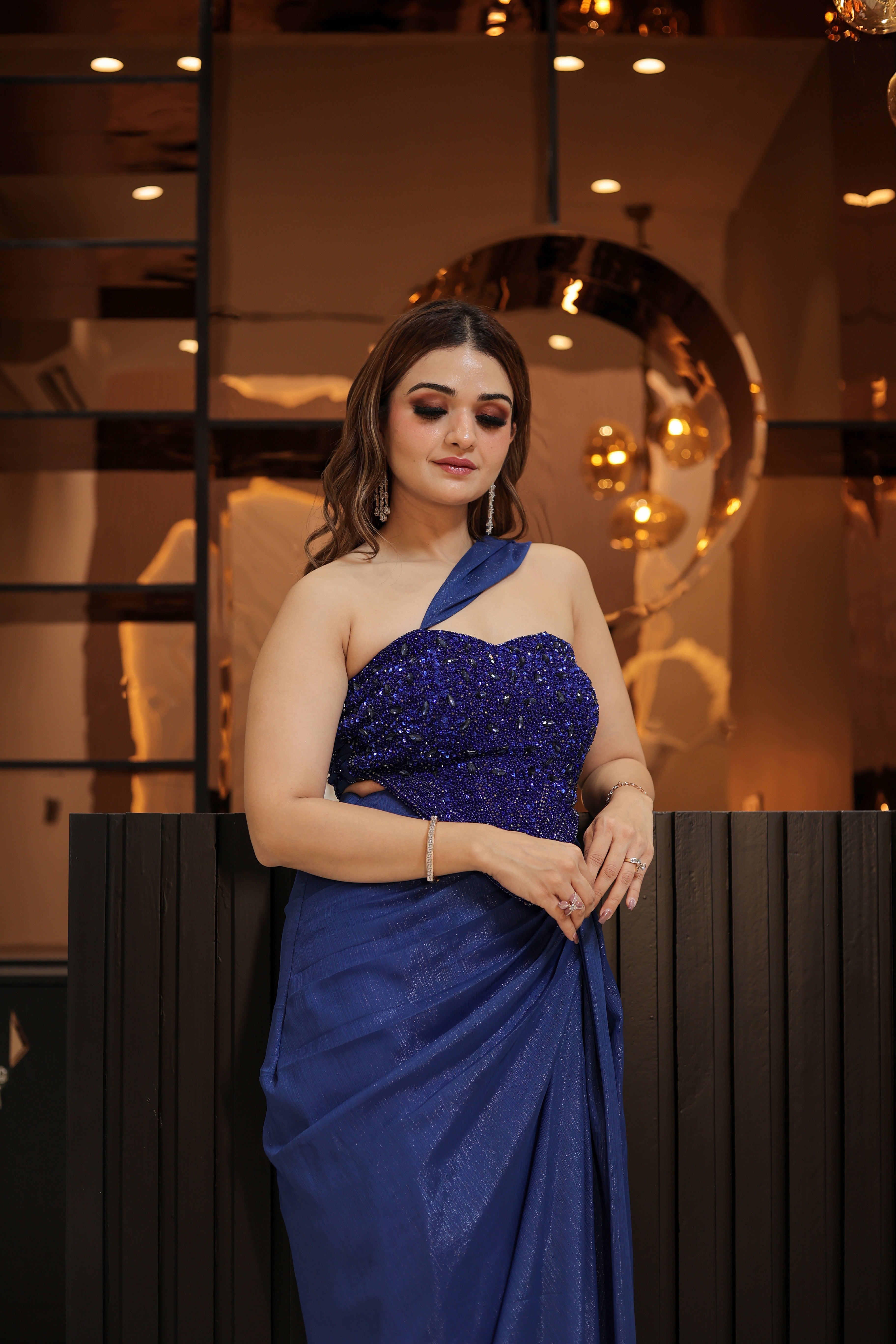 Blue crystal work corset blouse with drape skirt and trail