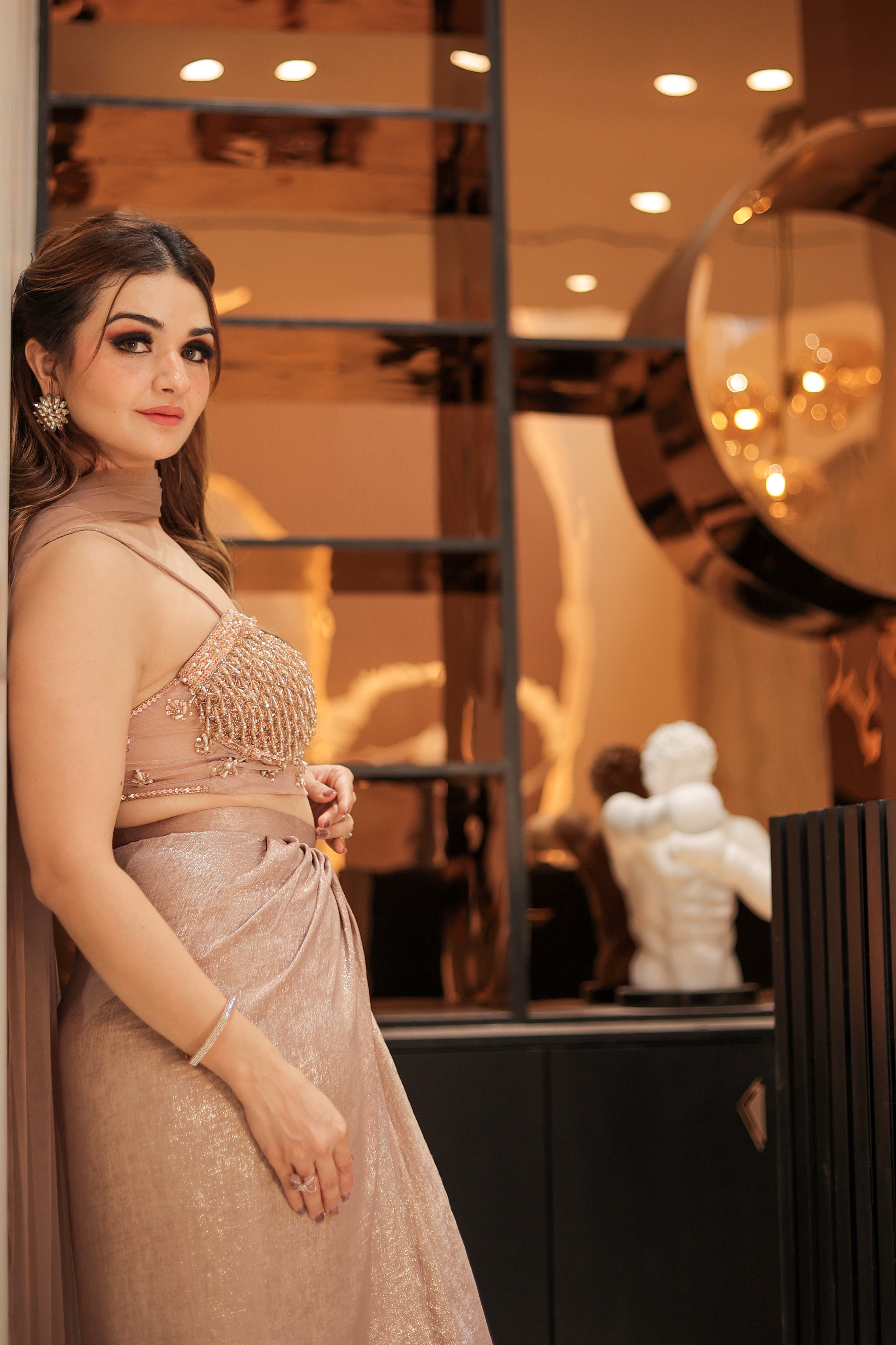 Golden crystal work corset blouse with drape skirt and trail
