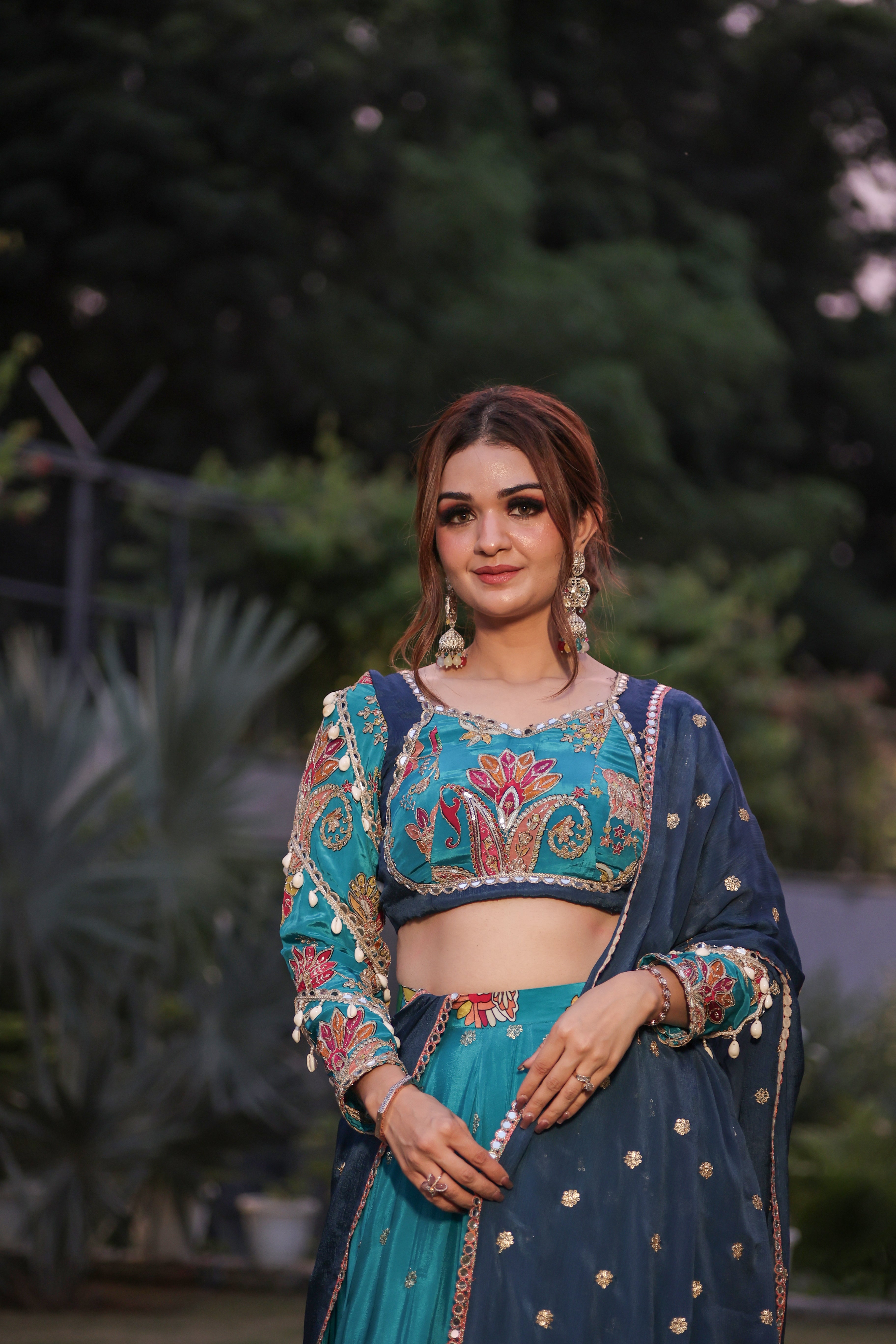 Peacock shade gujarati lehenga with 16 meter ghera