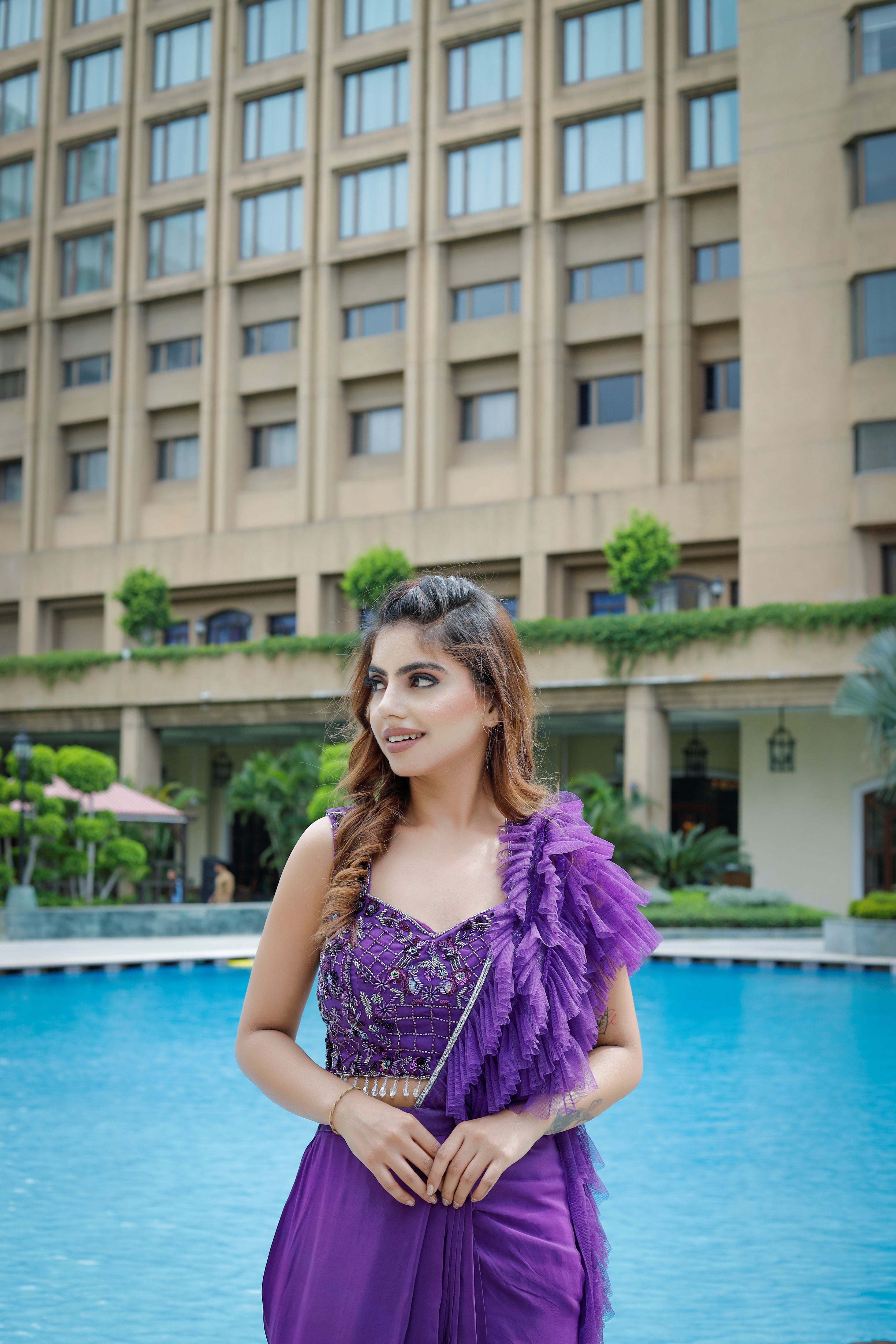 Purple Ruffle Saree with hand embroidered blouse