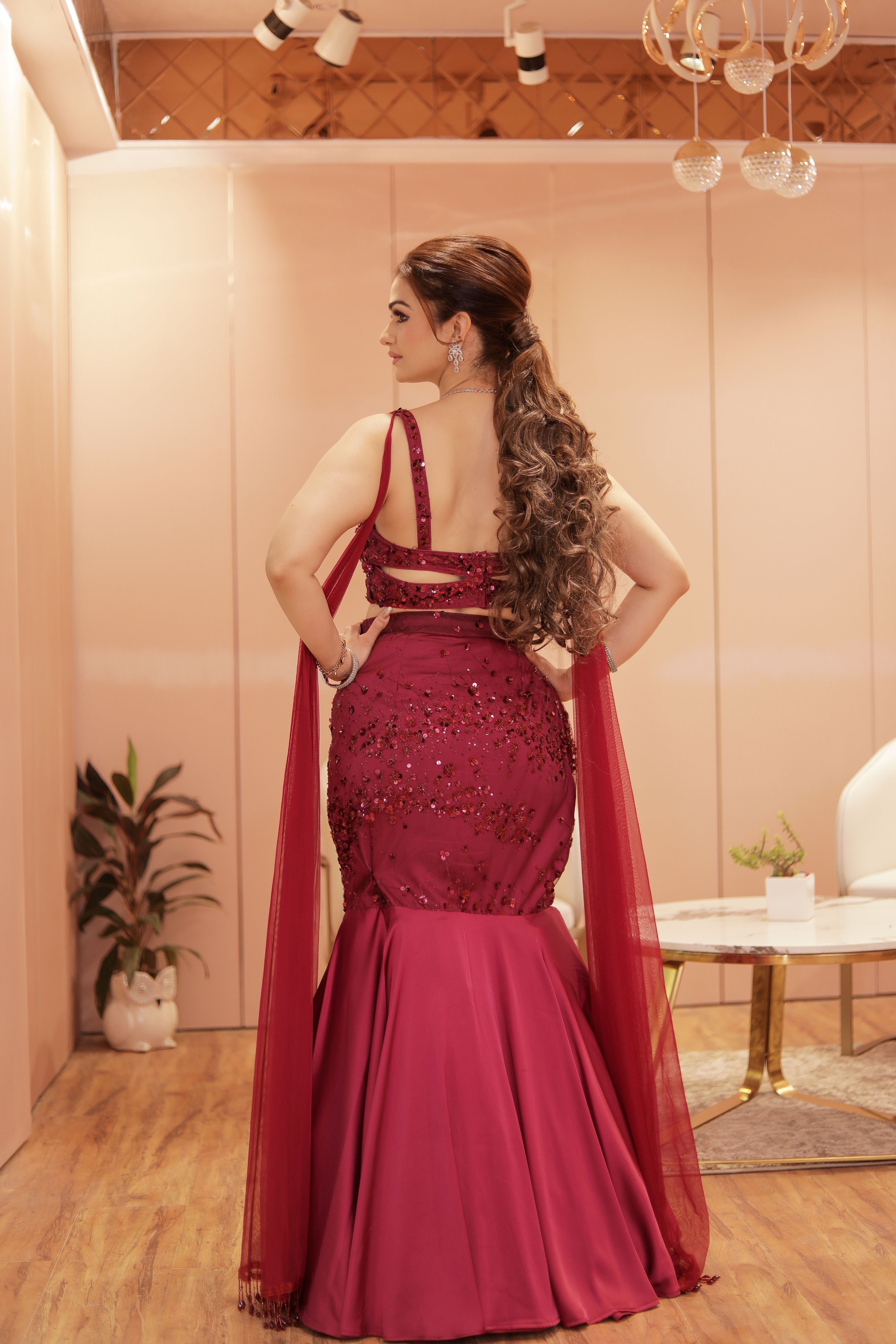 Red Embroidered Blouse with Fishcut skirt and trails at the back