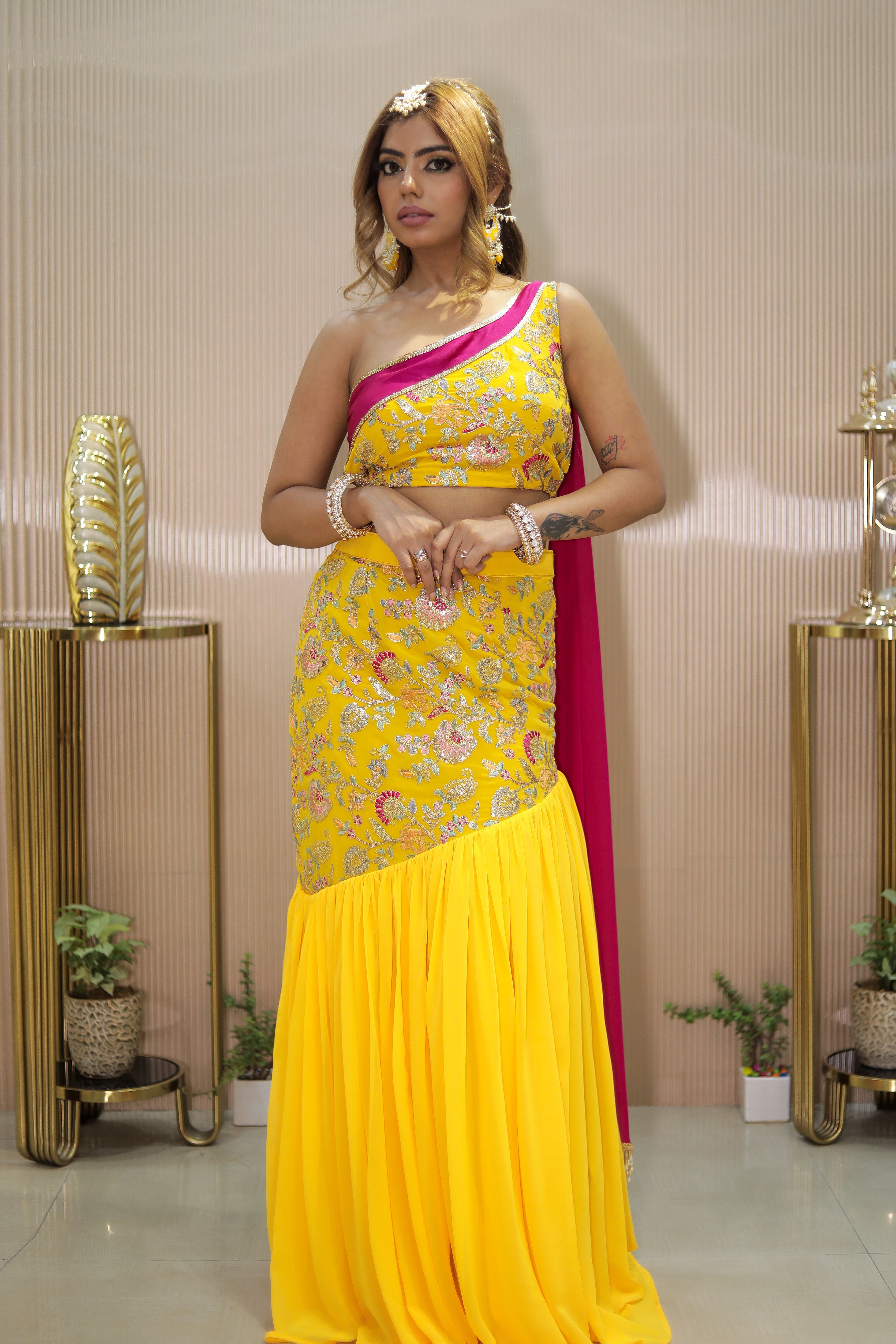 Yellow printed one shoulder blouse with Fishcut skirt