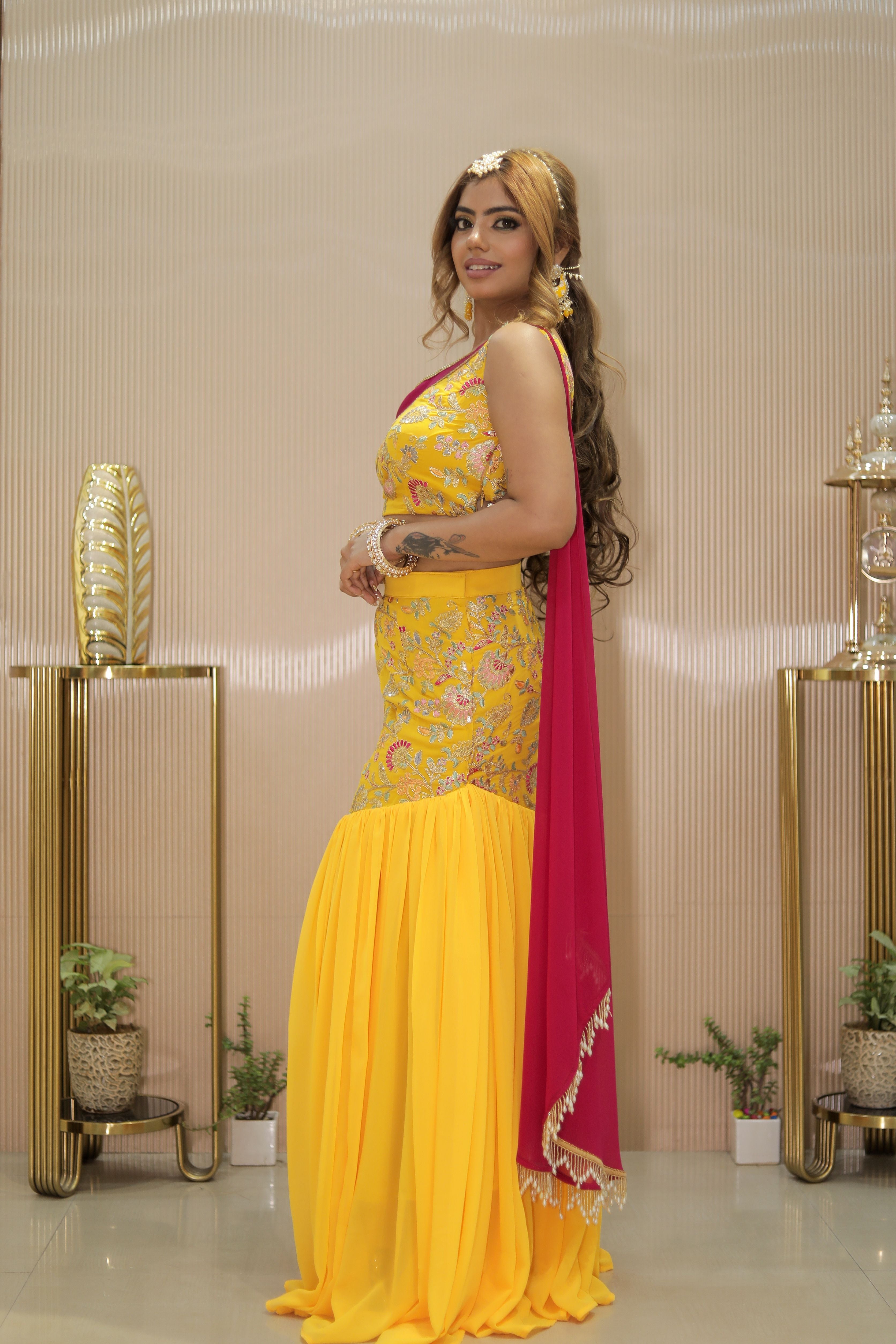 Yellow printed one shoulder blouse with Fishcut skirt