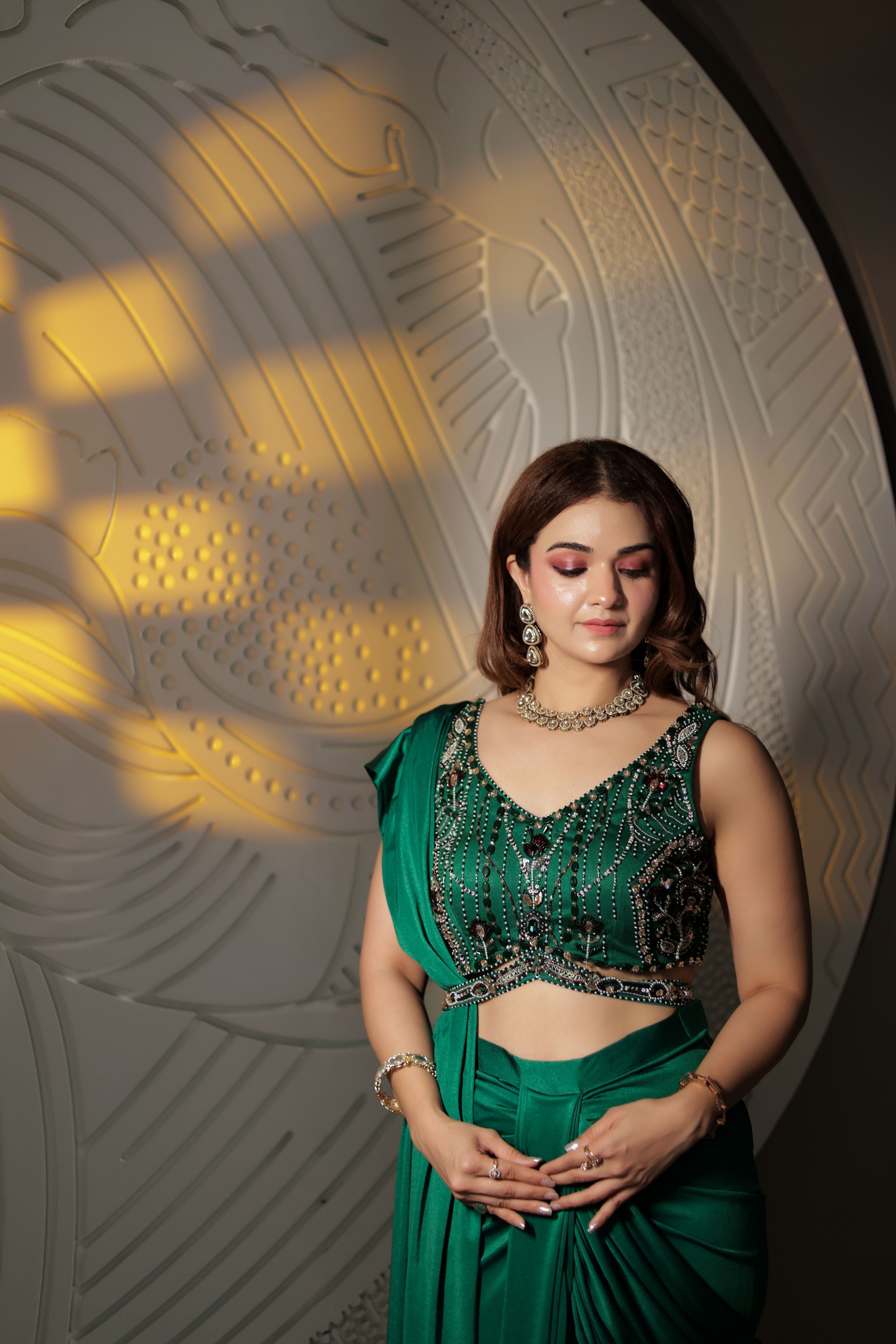 Bottle green blouse with Mehroon work Pre draped saree