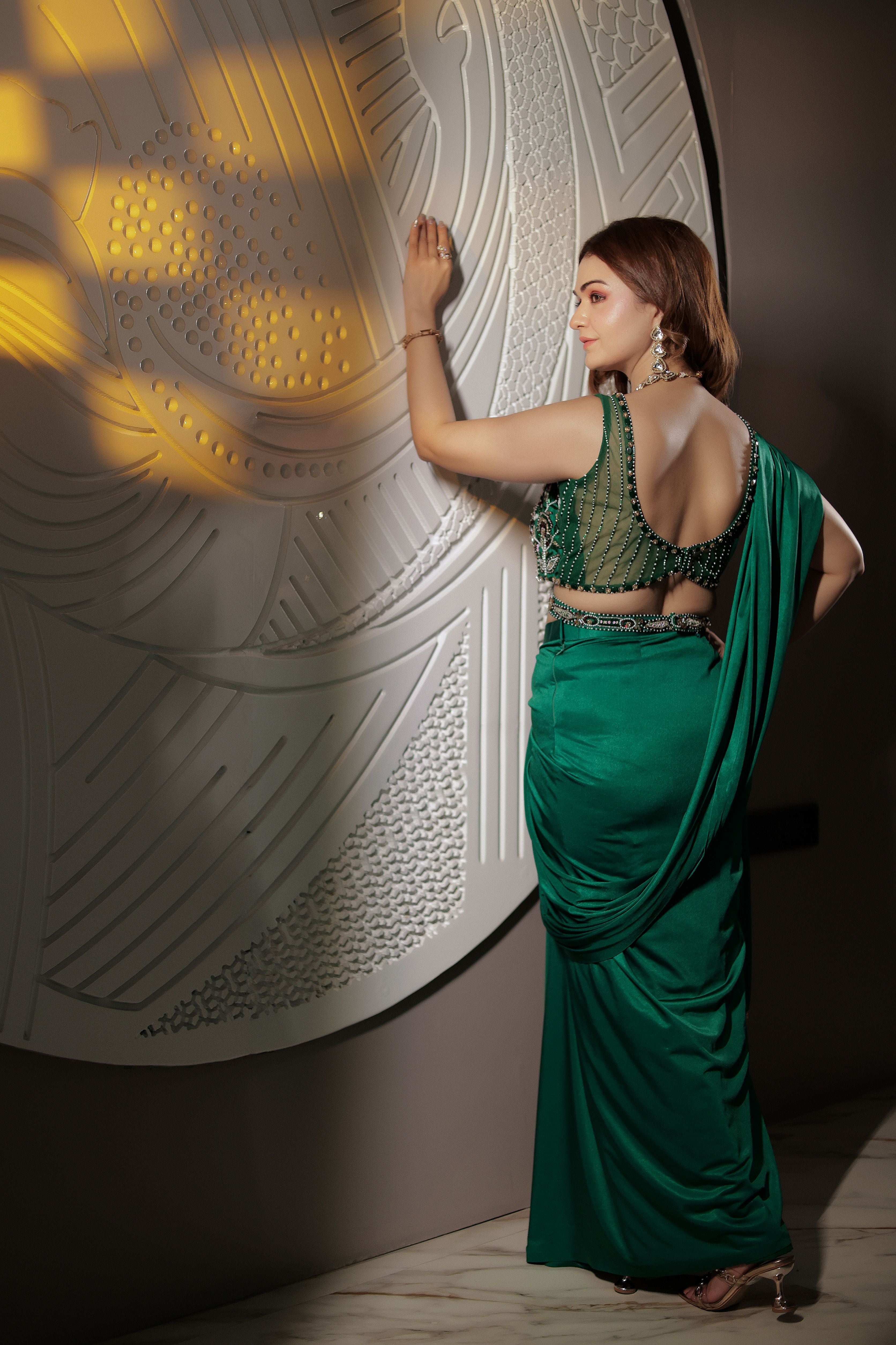 Bottle green blouse with Mehroon work Pre draped saree