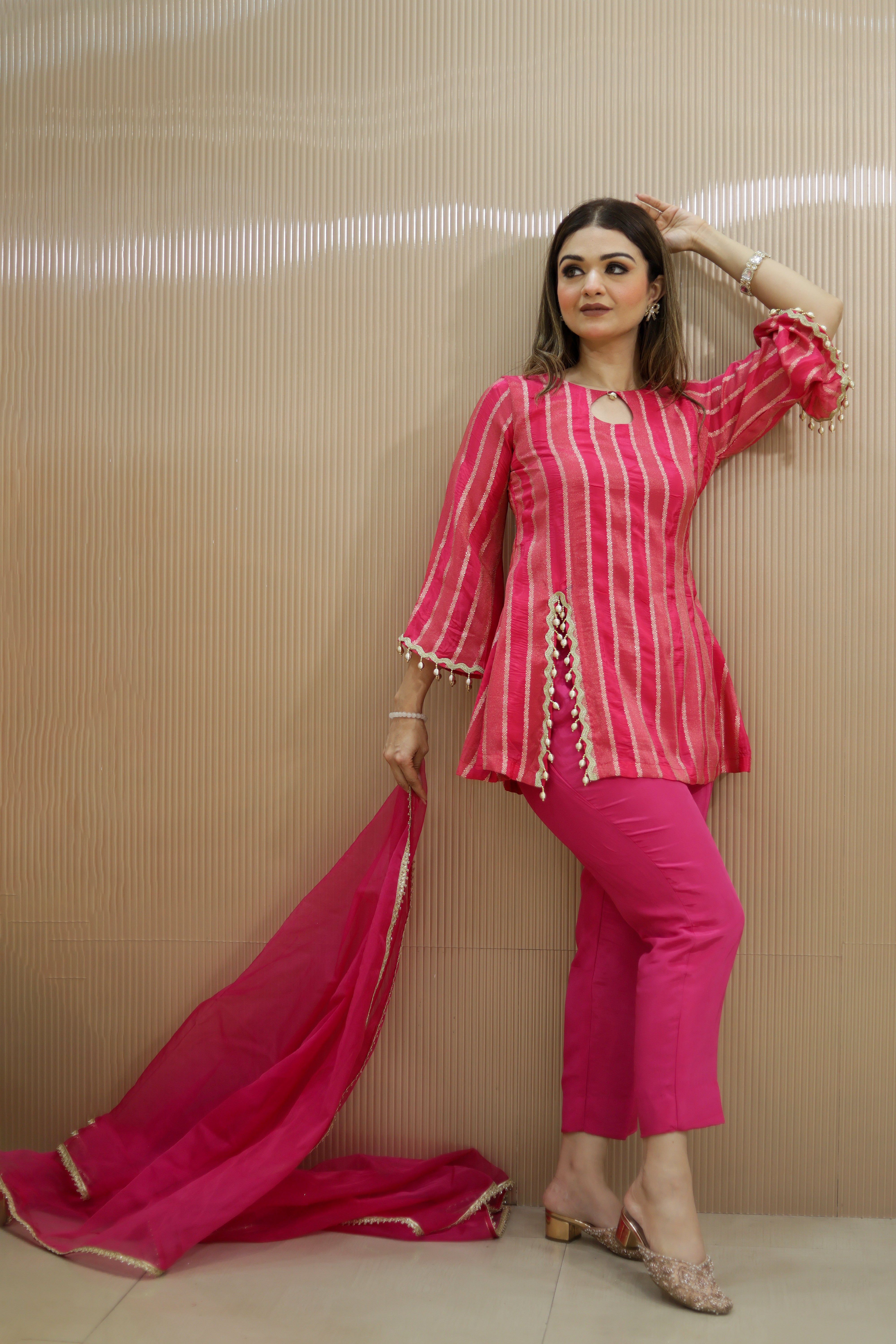 Fusia pink straight lines suit with bellbottoms and organza dupatta