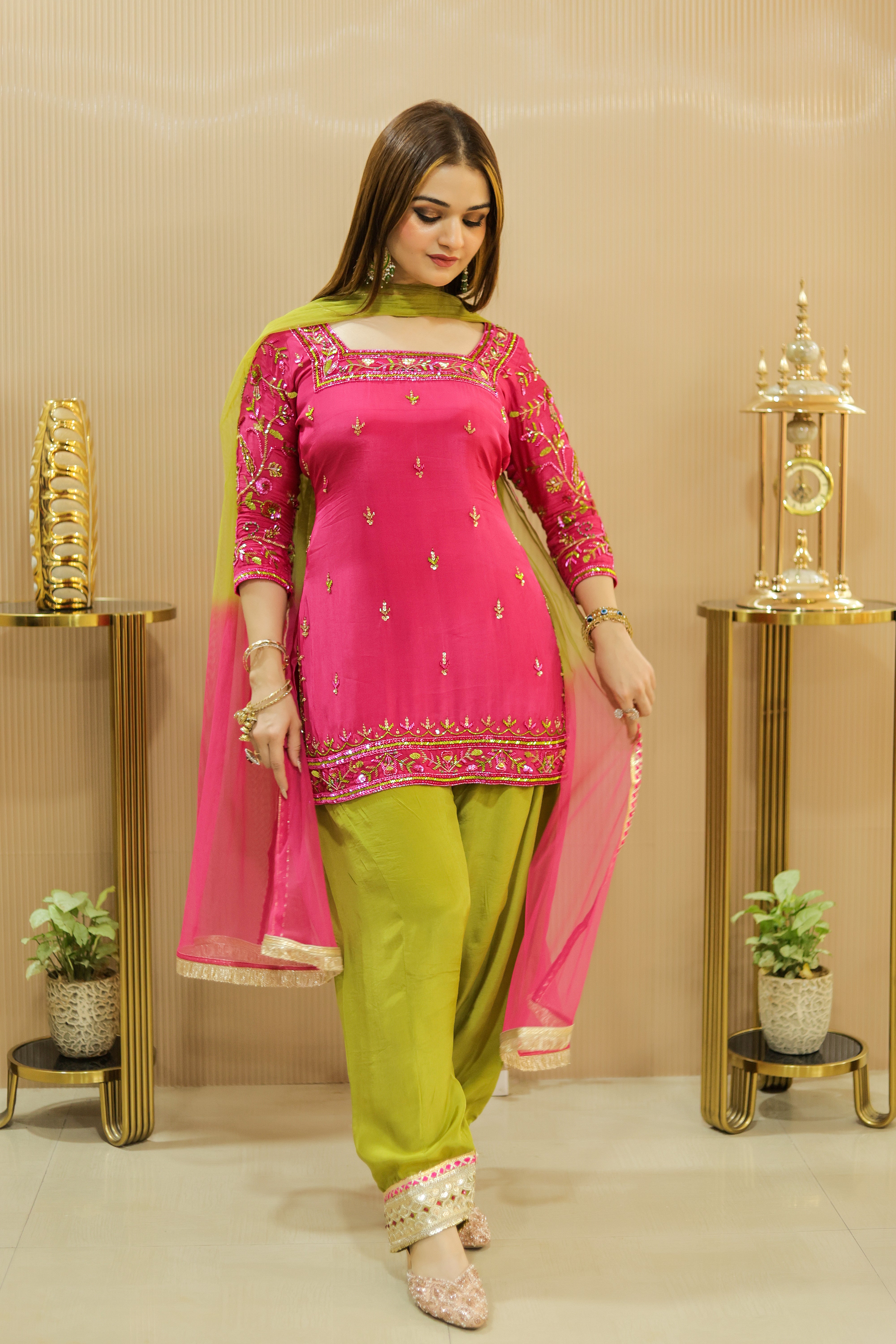 Fusia pink hand embroidered suit with mehndi green salwar