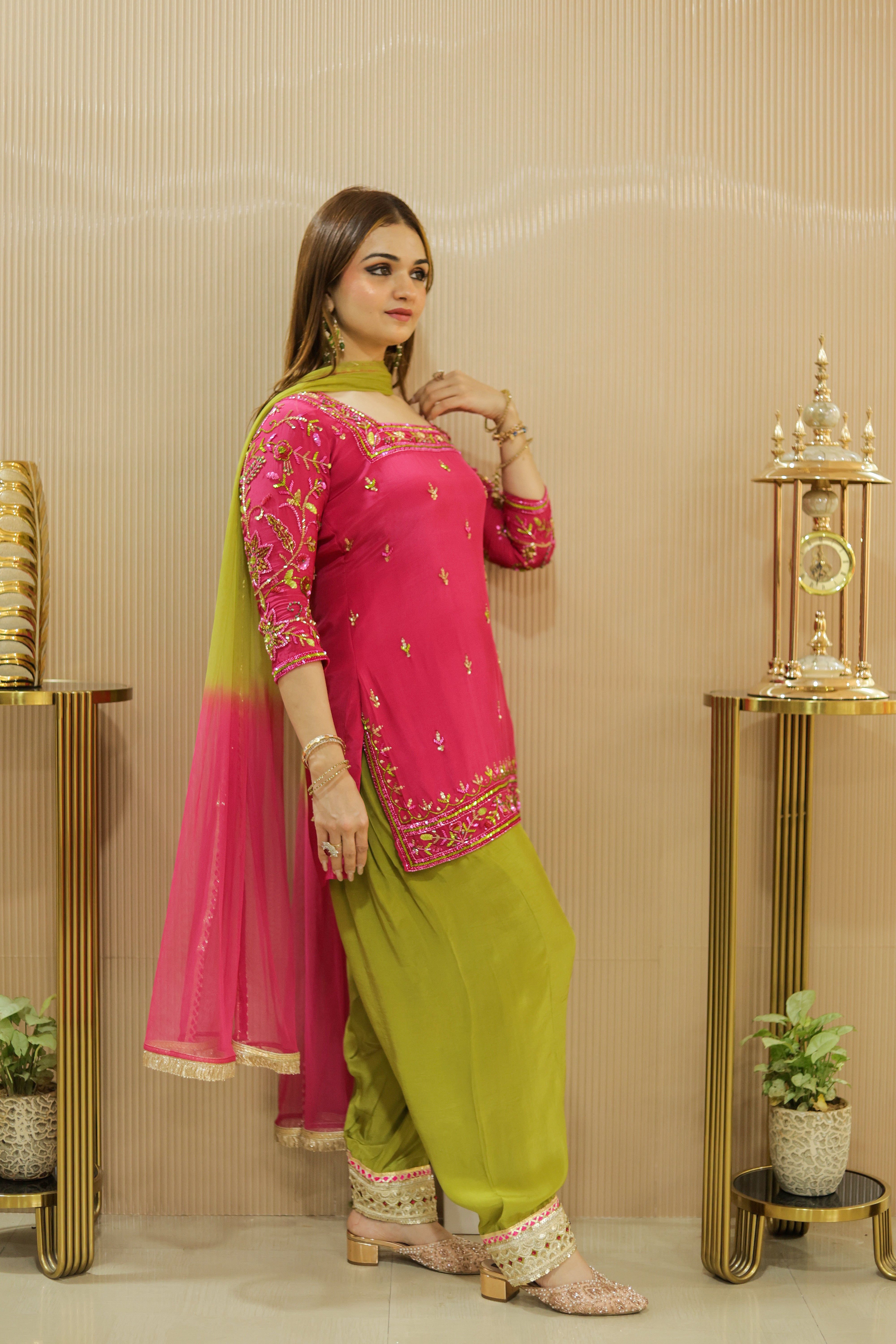 Fusia pink hand embroidered suit with mehndi green salwar