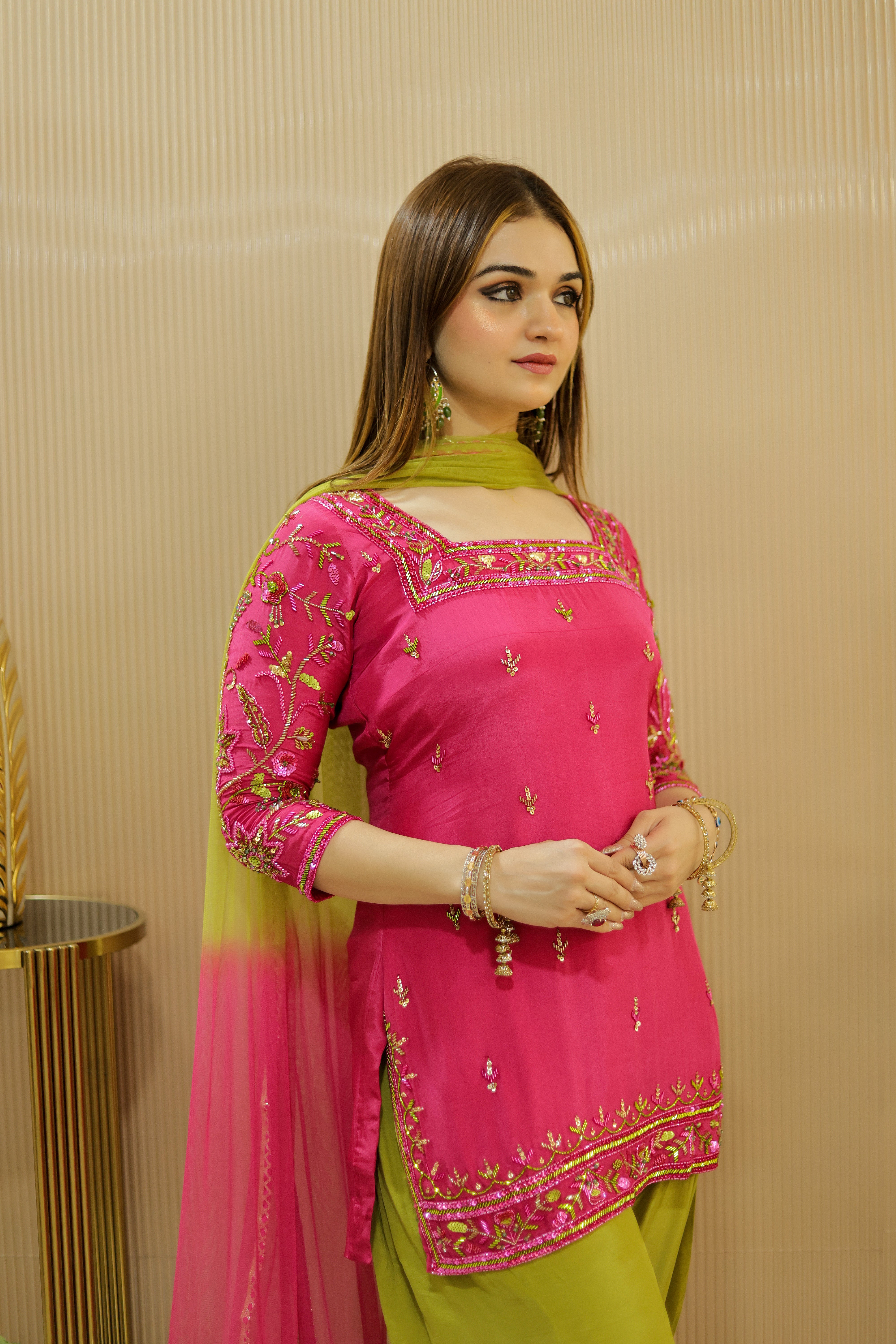 Fusia pink hand embroidered suit with mehndi green salwar
