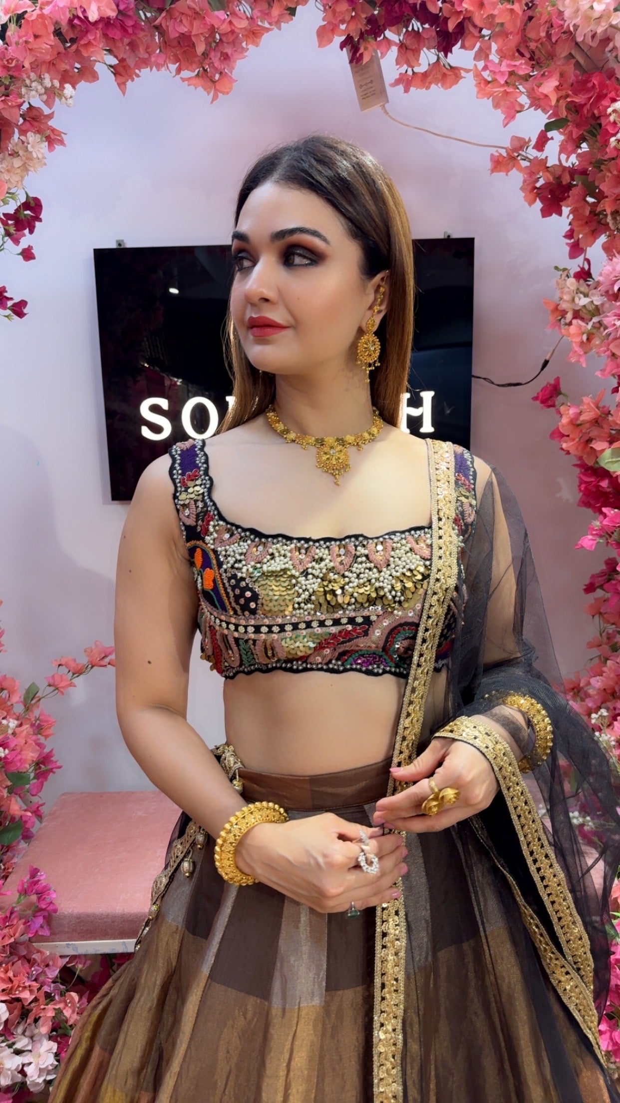 Black Metallic Multi Color Lehenga with heavy Embroidered Blouse Set and a net dupatta