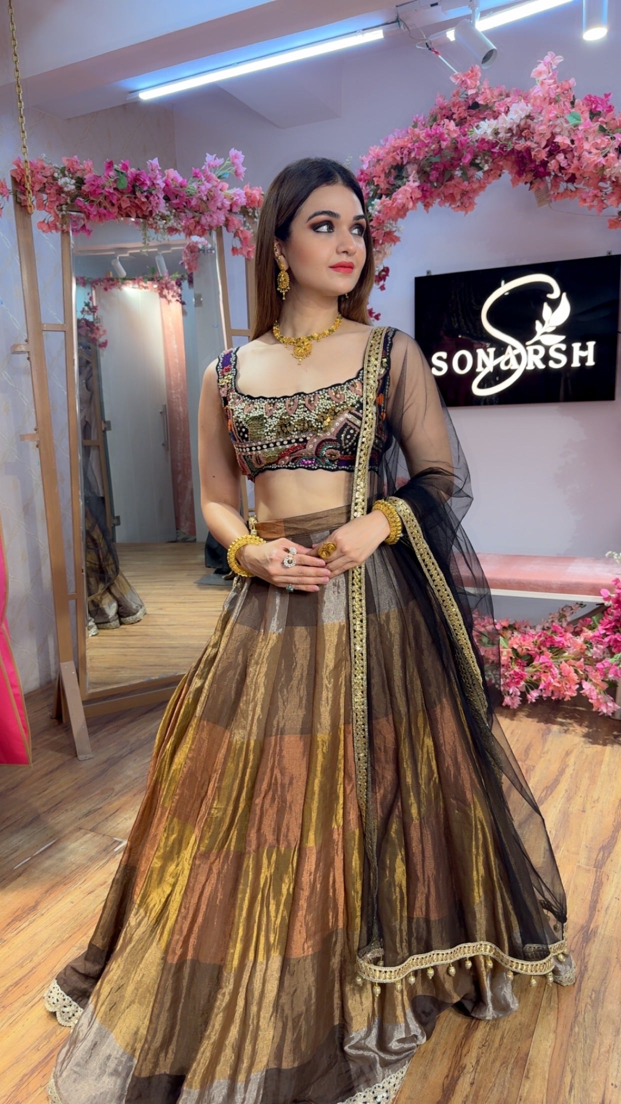 Black Metallic Multi Color Lehenga with heavy Embroidered Blouse Set and a net dupatta