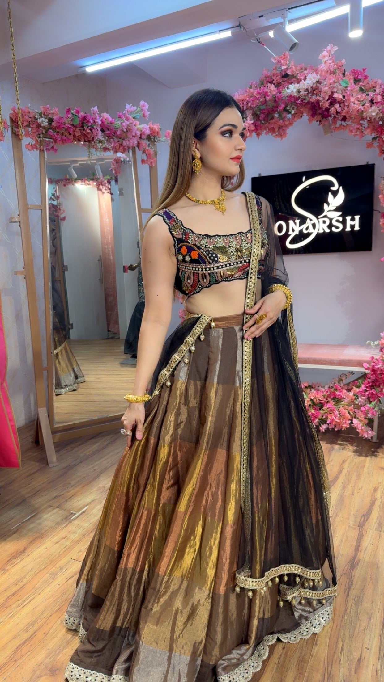 Black Metallic Multi Color Lehenga with heavy Embroidered Blouse Set and a net dupatta