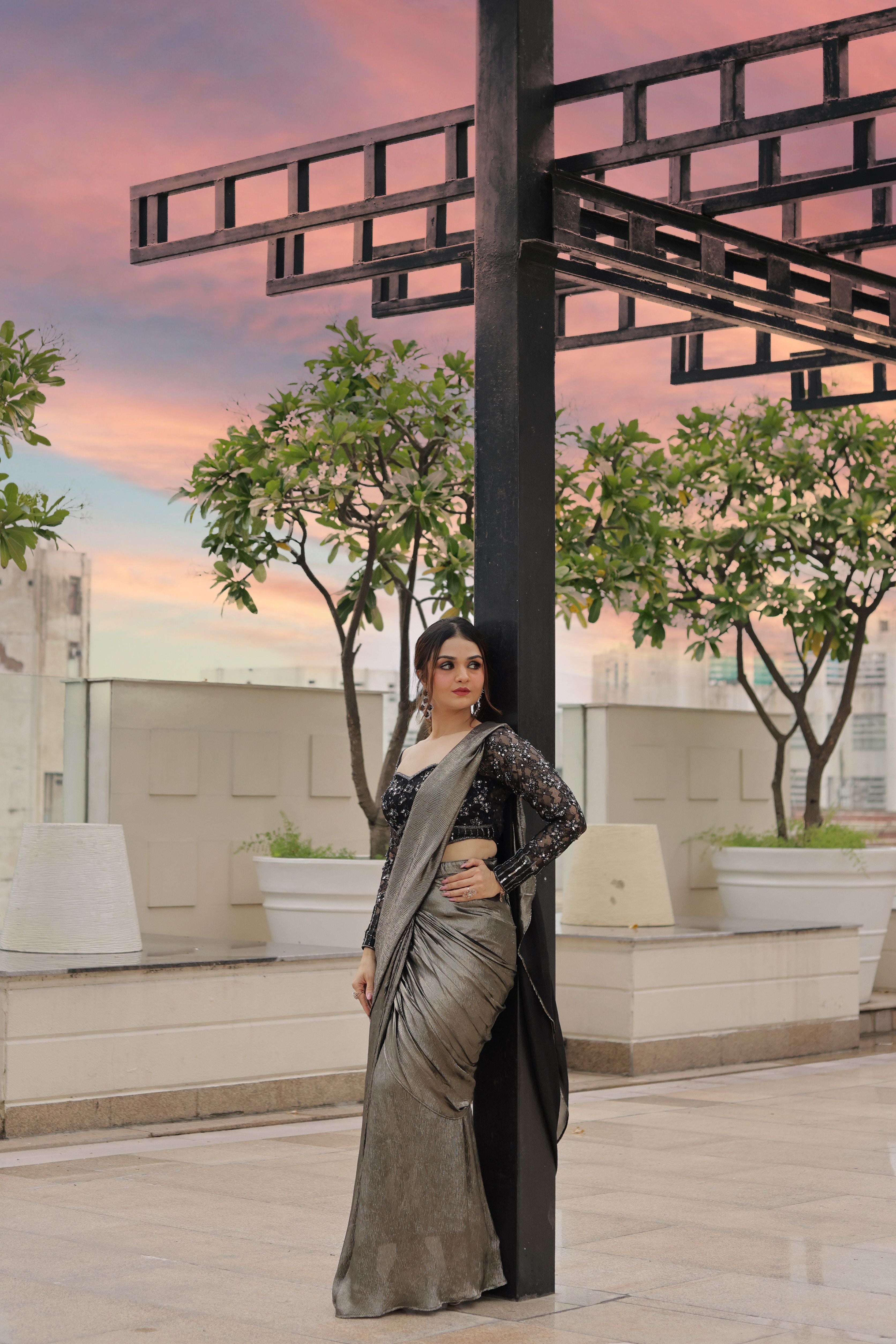 Black corset blouse with silver Drape saree