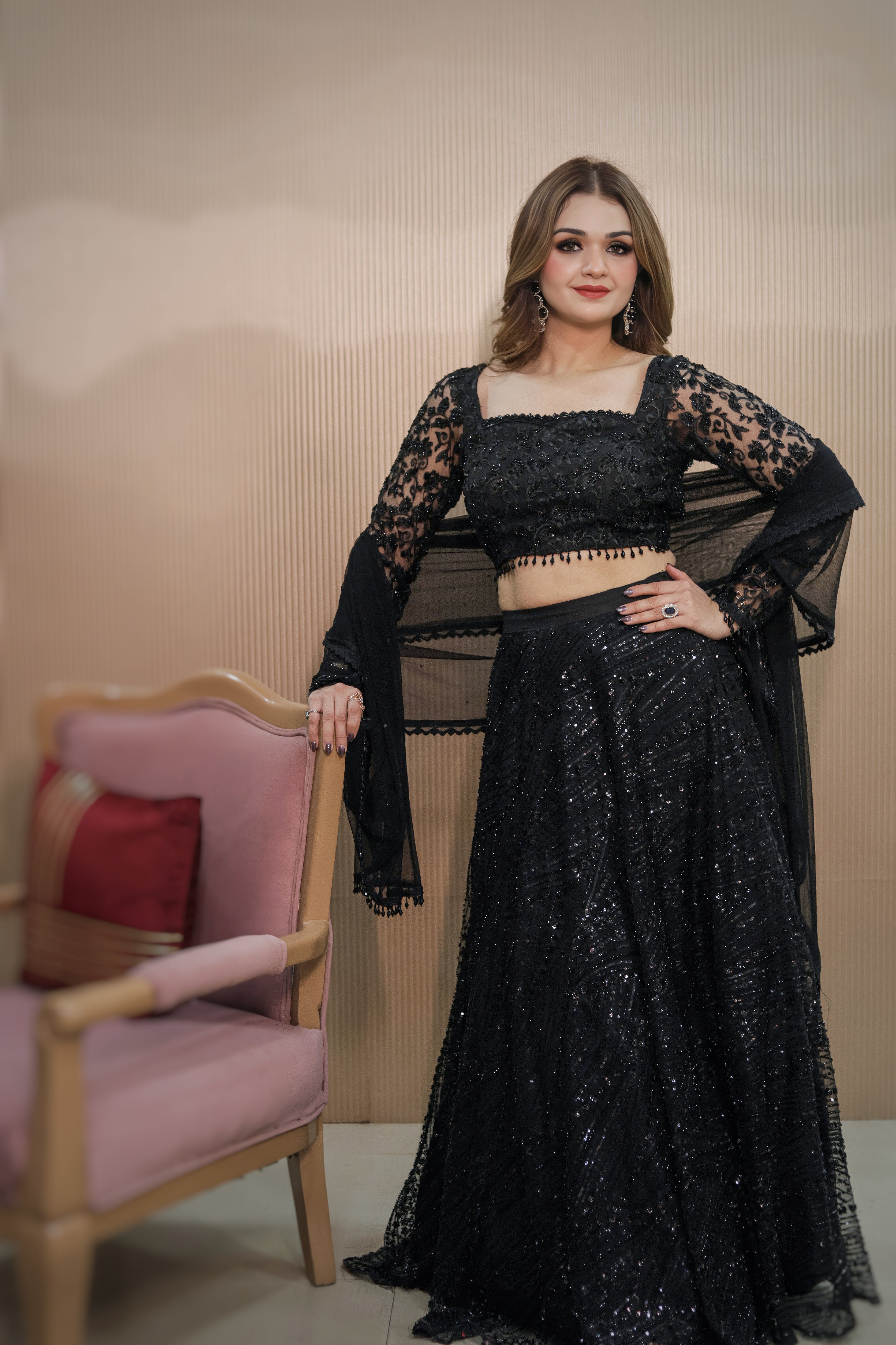 Black fabric based lehenga with net dupatta