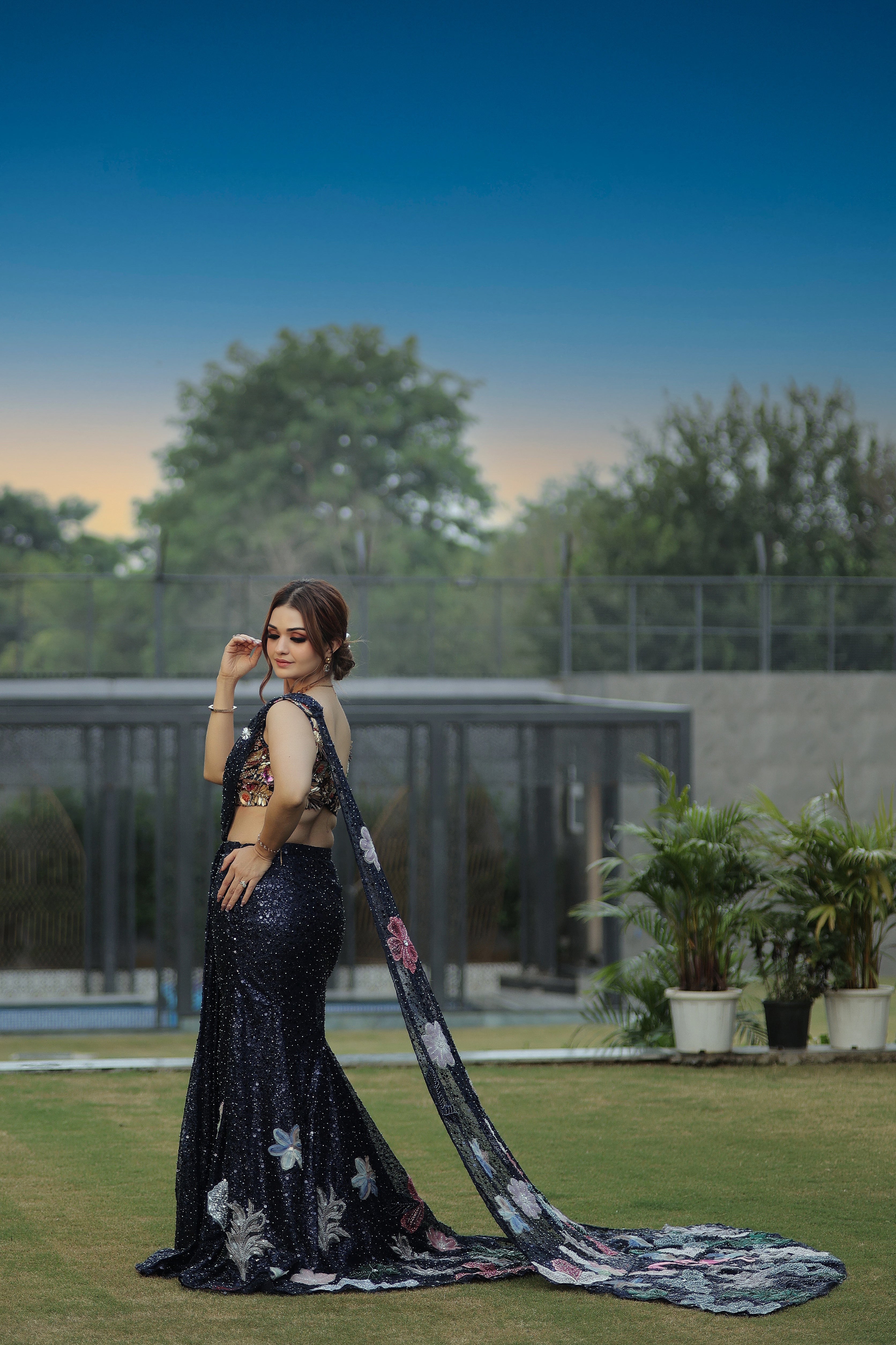 Blue sequin pearl drape saree with hand embroidered bird blouse