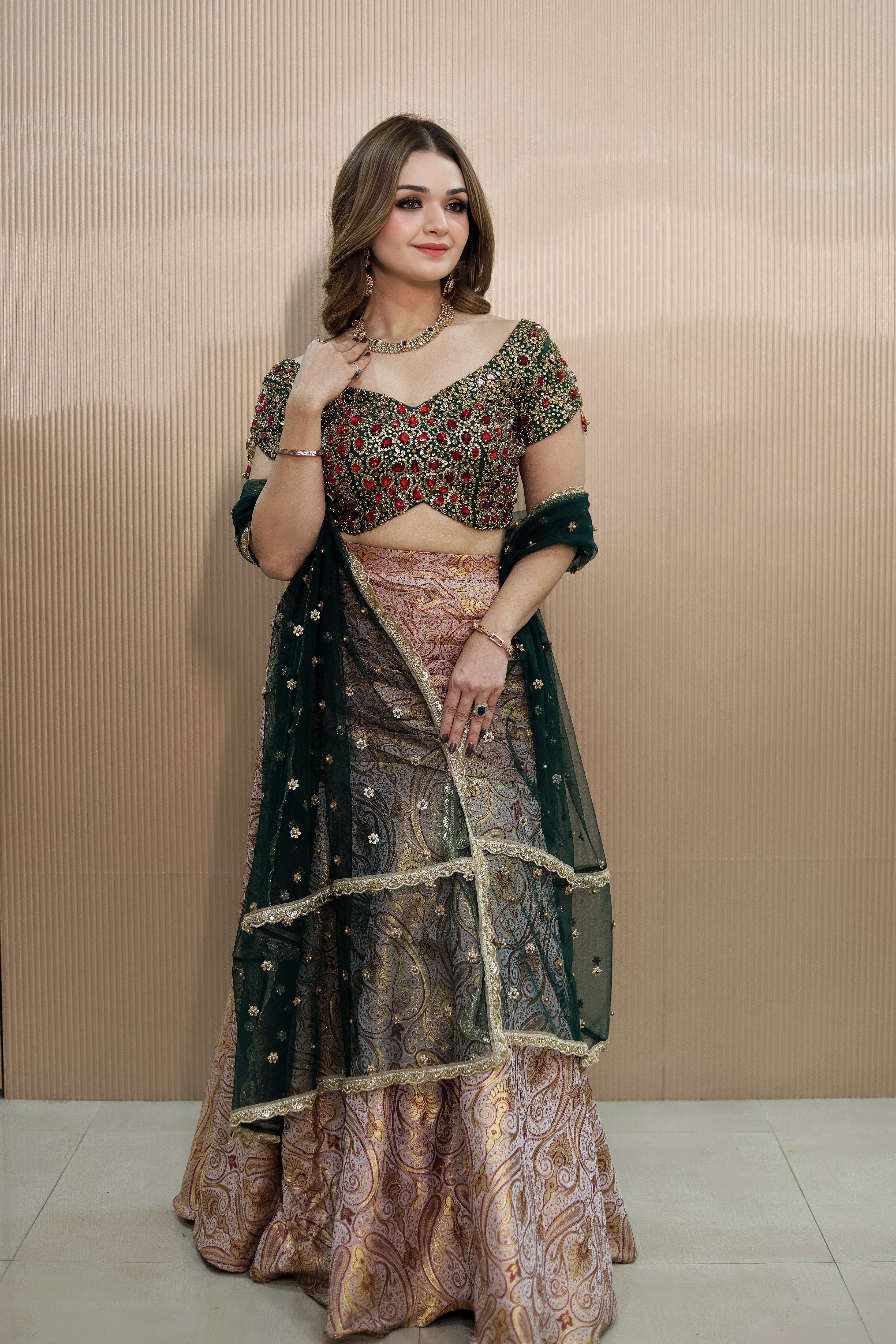 Kundan and stone work Blouse with Banarasi drape skirt and net dupatta