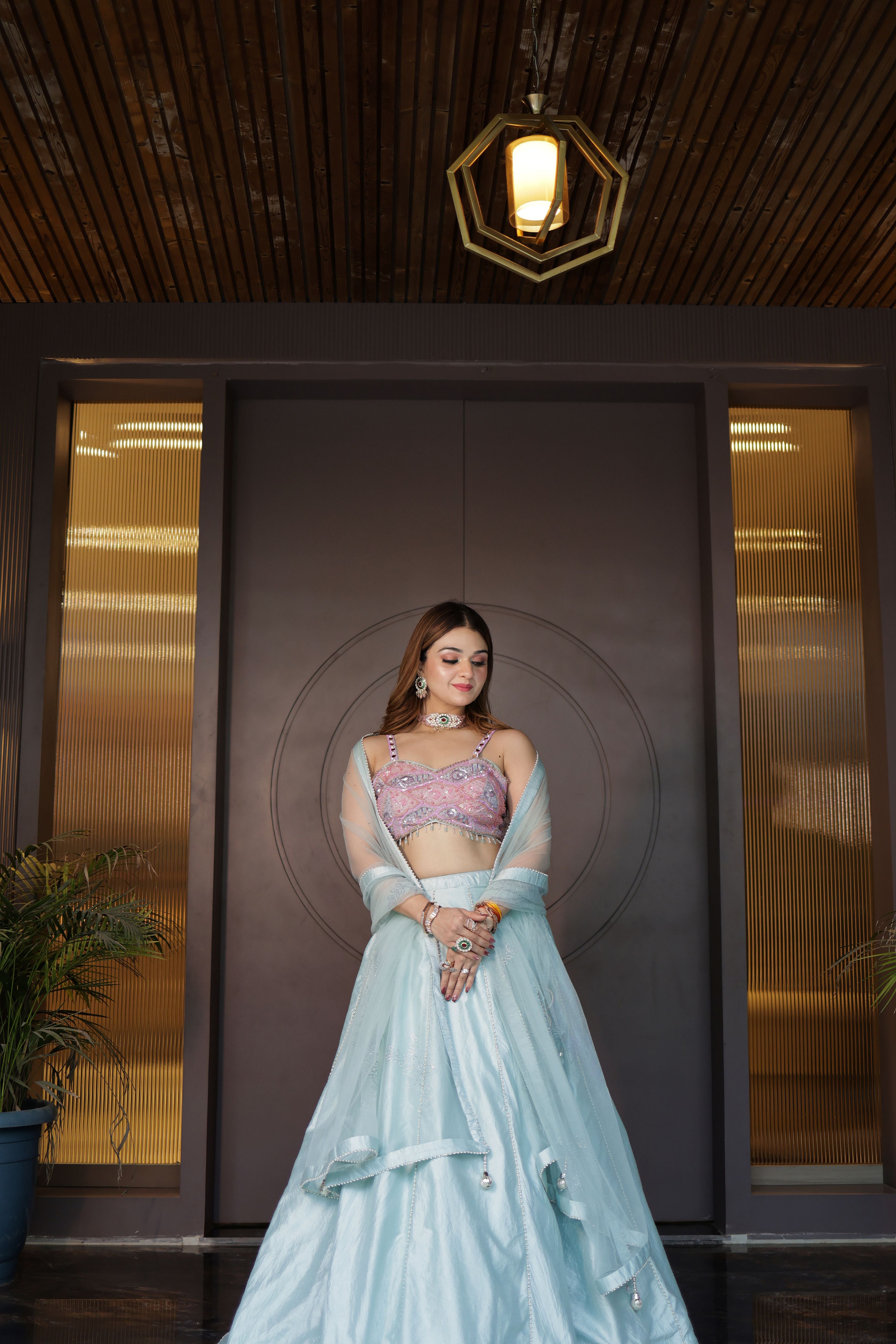 Powder blue Pearlwork Raw Silk Lehenga with pink choli blouse