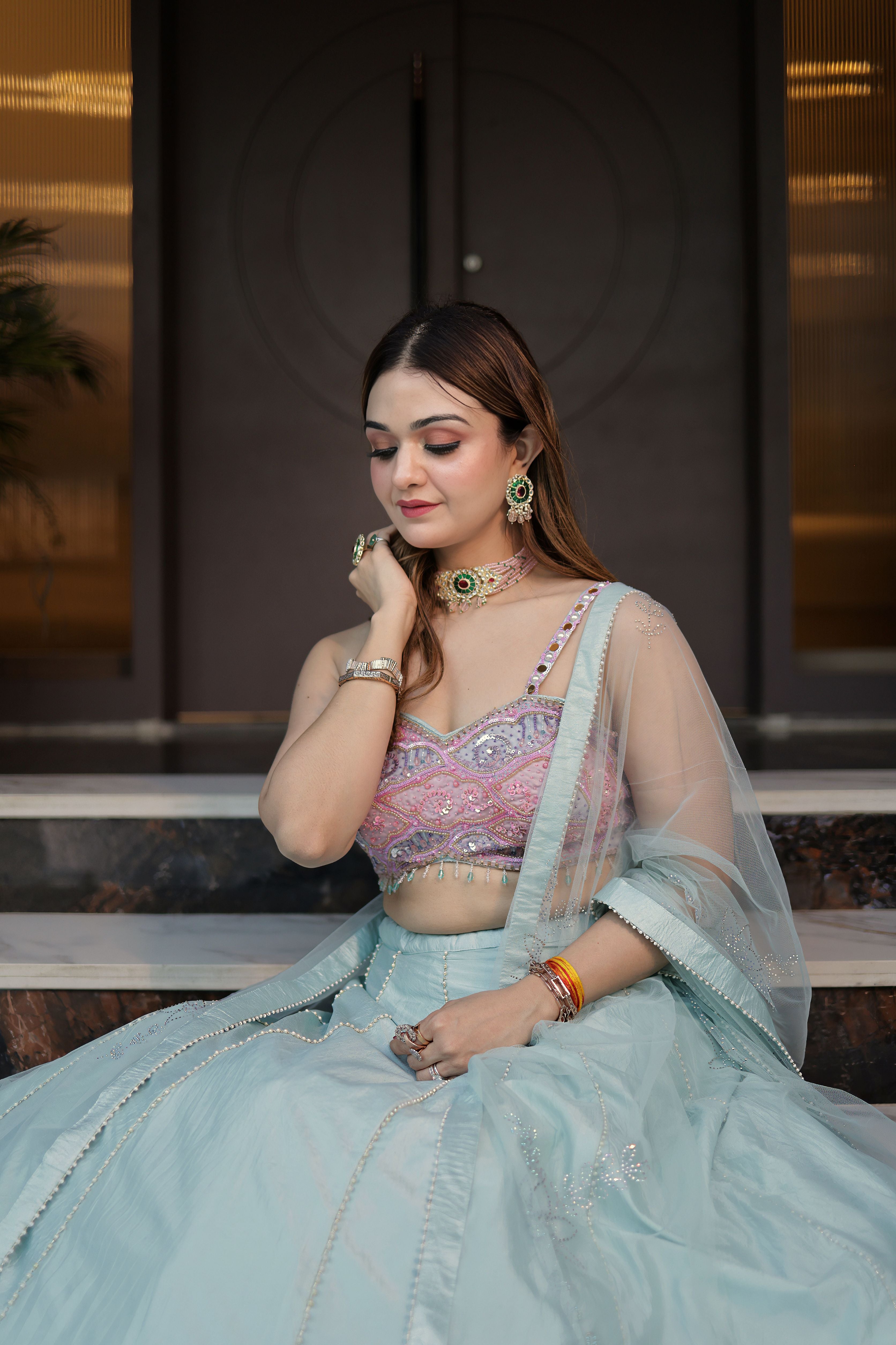 Powder blue Pearlwork Raw Silk Lehenga with pink choli blouse