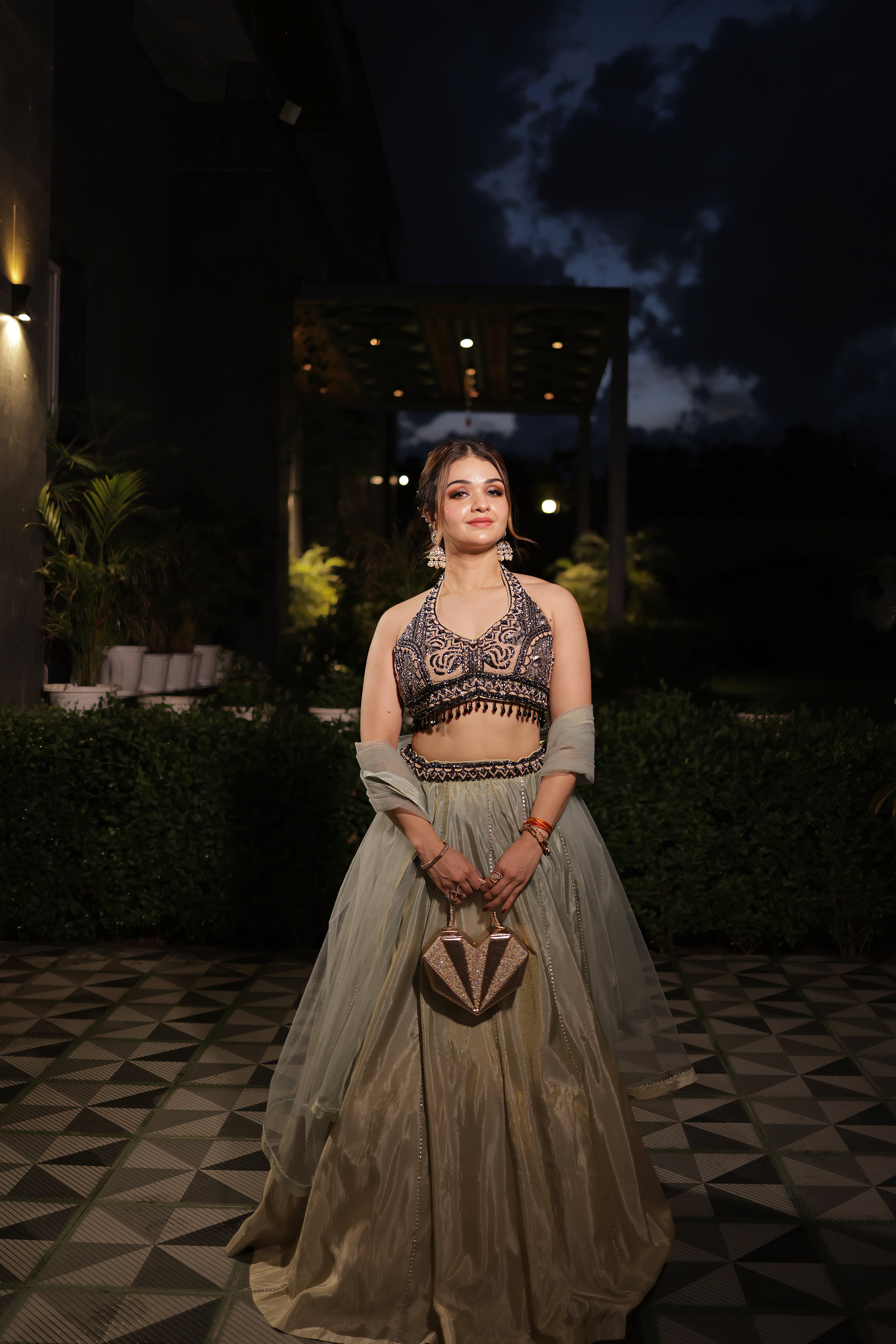 Sea Green and black bead work choli with Raw Silk Lehenga